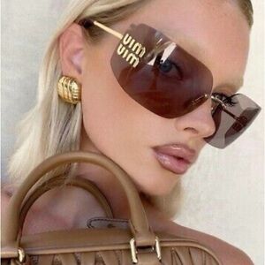 Miu Miu Brown Rimless Sunglasses Modern Design